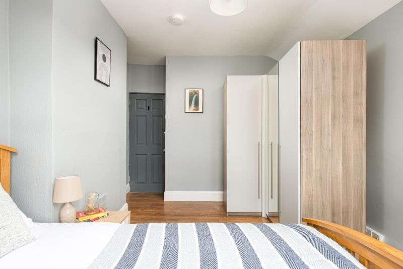 Property photo 3 of 15 Bright, Neatly Presented Bedroom With A Striped Be...