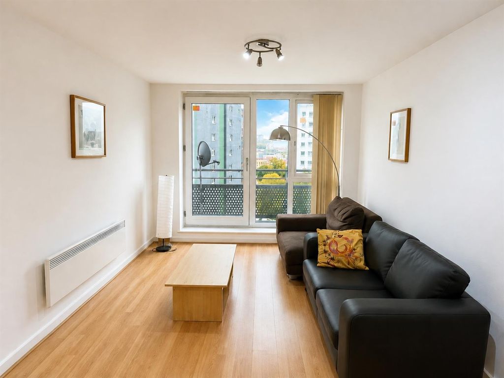 Property photo 1 of 7 Bright Living Room With Large Floor-To-Ceiling Win...
