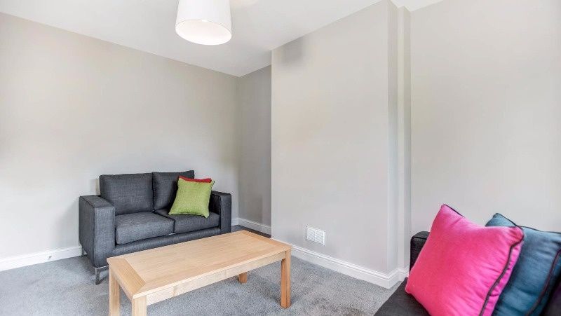 Property photo 2 of 11 Bright, Neutral-Toned Living Room With Modern Grey...