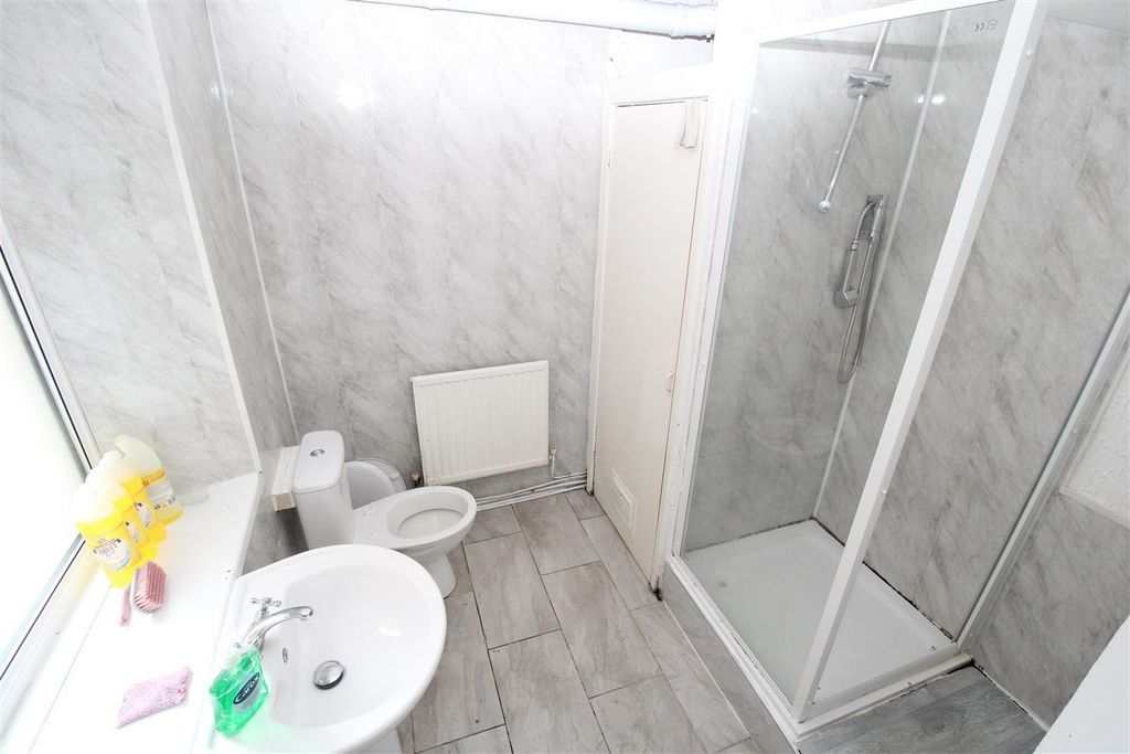 Property photo 3 of 7 Bright Bathroom With Modern Walk-In Shower....