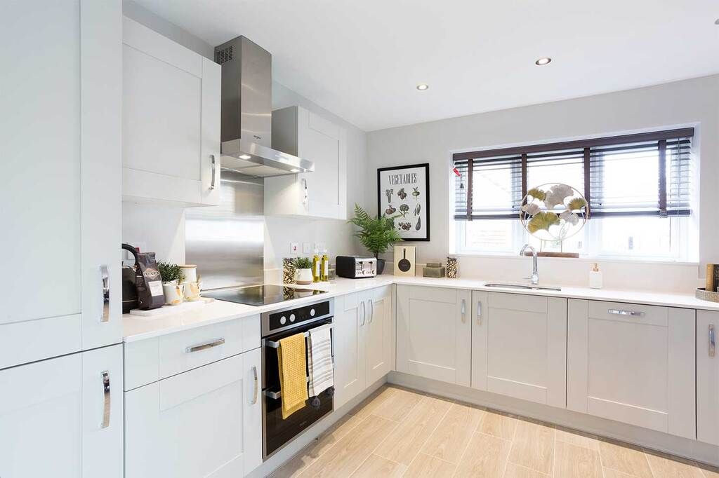 Property photo 2 of 7 Typical Kitchen