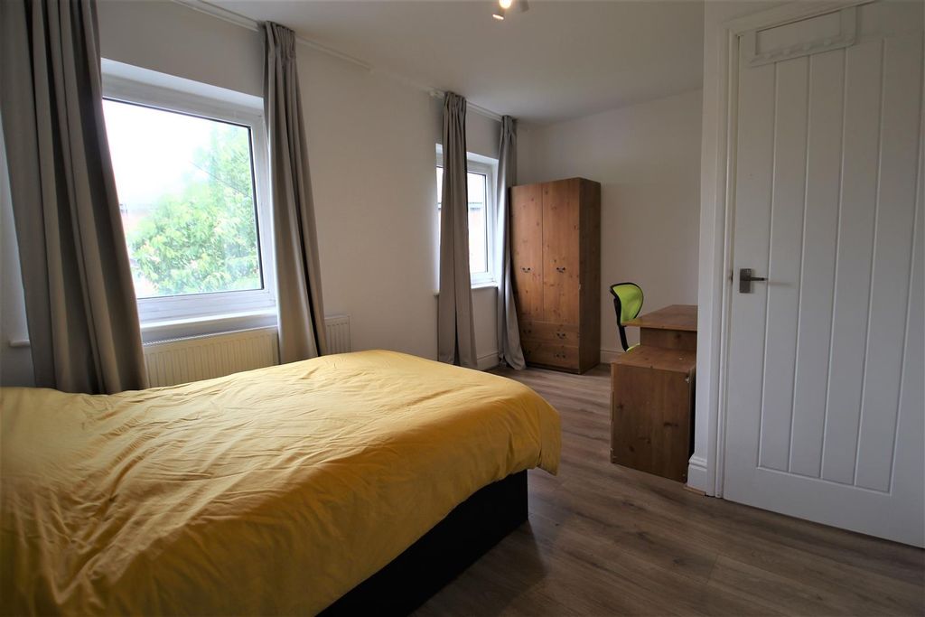 Property photo 2 of 11 Bright And Airy Double Bedroom Featuring Two Large...