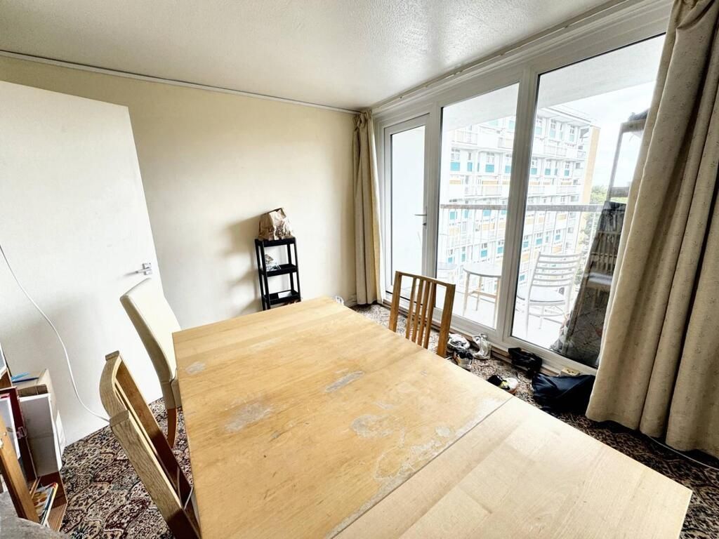 Property photo 2 of 13 Bright Dining Area With Large Windows...