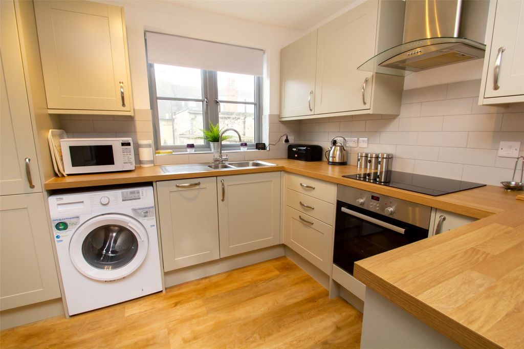 Property photo 3 of 16 Kitchen