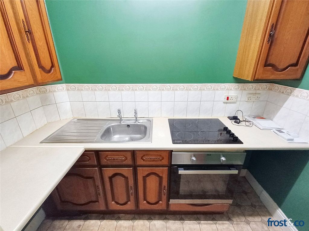 Property photo 3 of 7 Kitchen