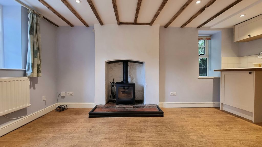 Property photo 3 of 9 Lounge With Wood Burner