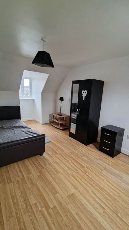 Property photo 2 of 4 Bright And Airy Bedroom With Ample Floor Space...