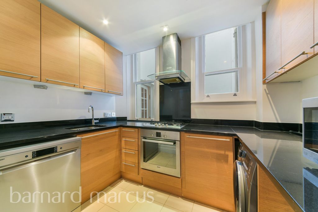 Property photo 3 of 8 Kitchen