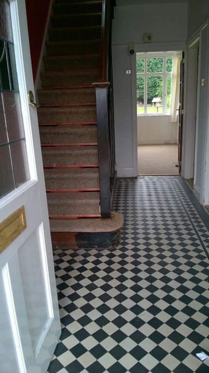 Property photo 3 of 11 Hallway To Dining Room