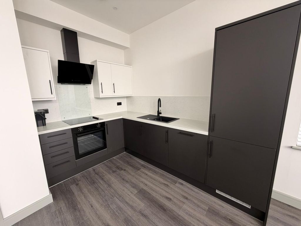 Property photo 2 of 11 Kitchen