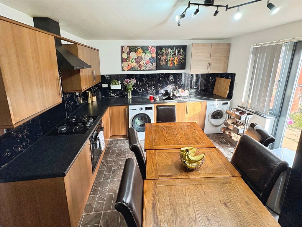 Property photo 3 of 12 Dining Kitchen