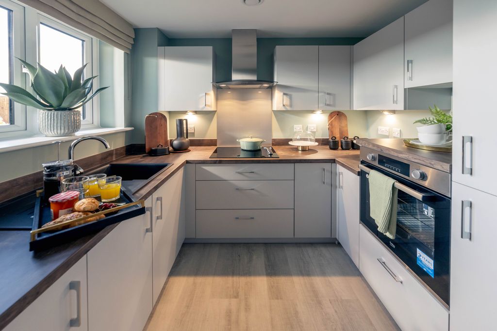Property photo 2 of 10 Typical Kitchen