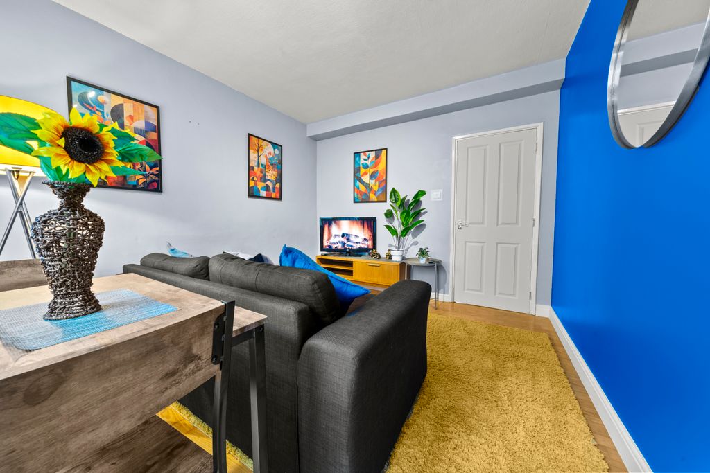 Property photo 2 of 8 Living Area