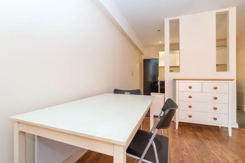 Property photo 3 of 8 Living Area