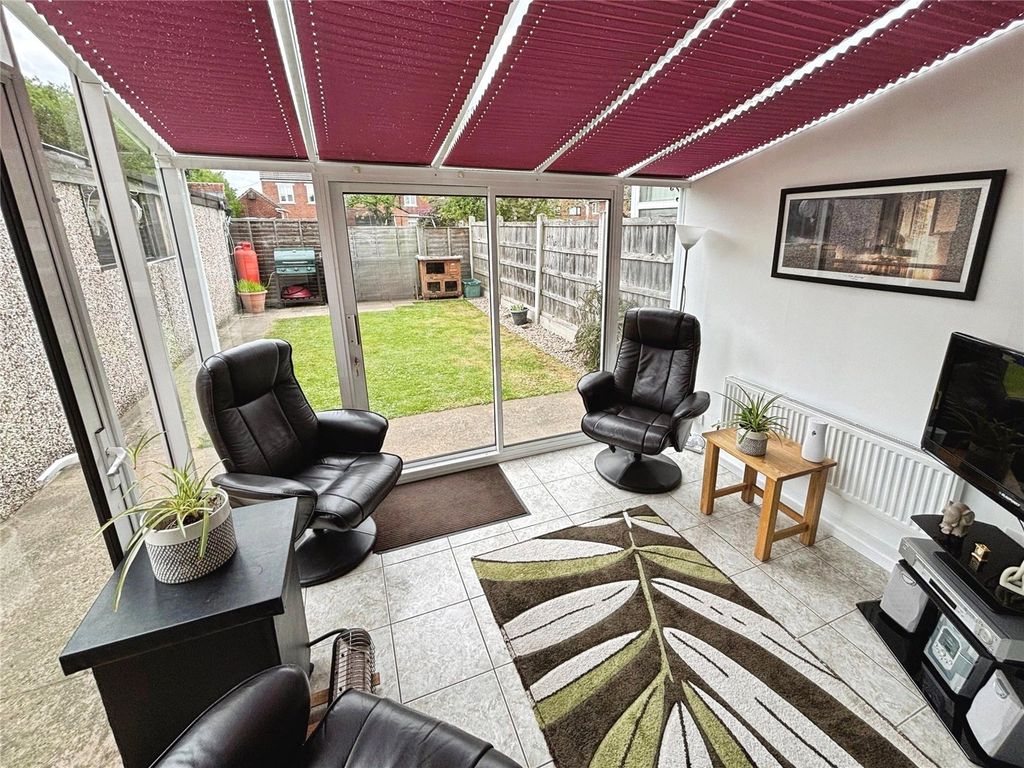 Property photo 3 of 12 Conservatory