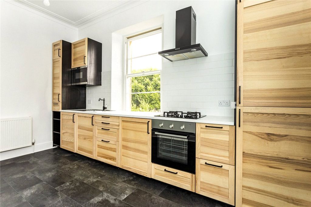 Property photo 3 of 8 Kitchen