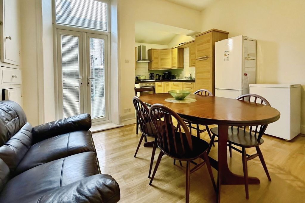 Property photo 3 of 12 Kitchen Dining Room
