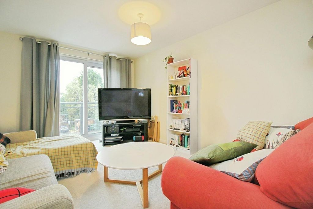 Property photo 2 of 13 Living Area