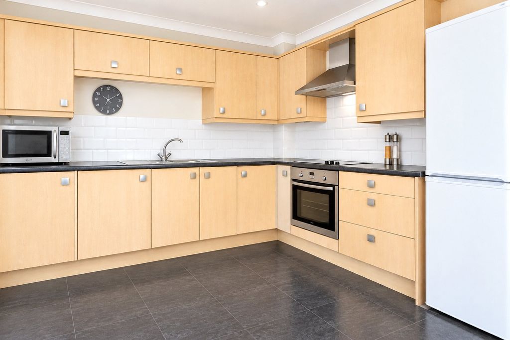 Property photo 3 of 8 Kitchen
