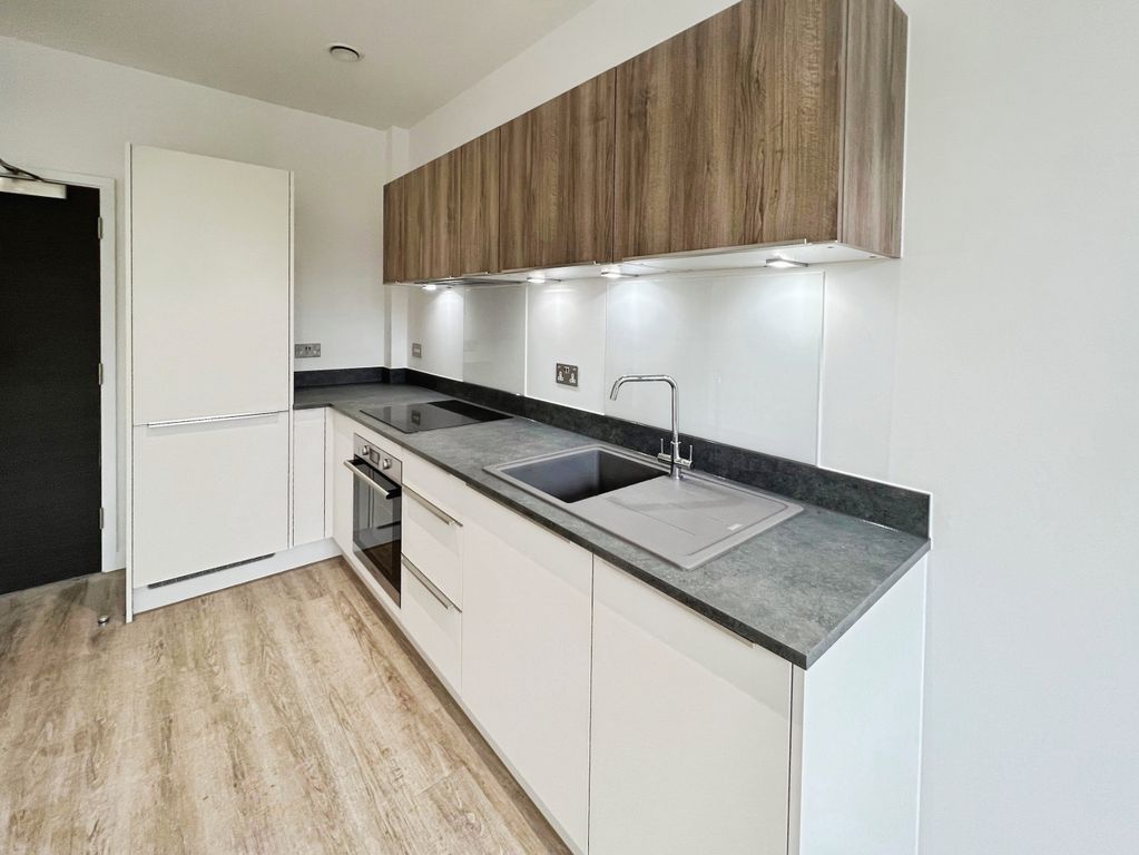 Property photo 2 of 6 Kitchen Area