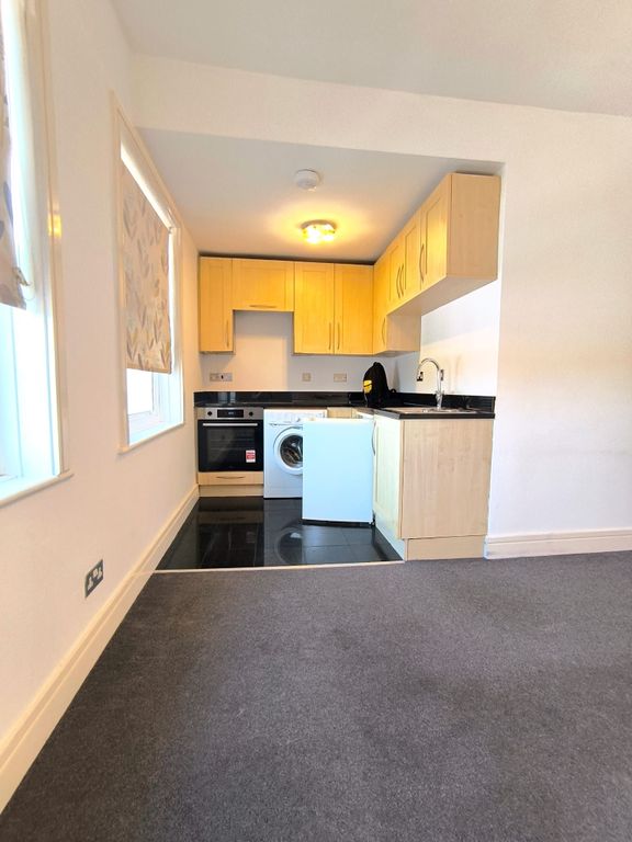 Property photo 3 of 9 Kitchen