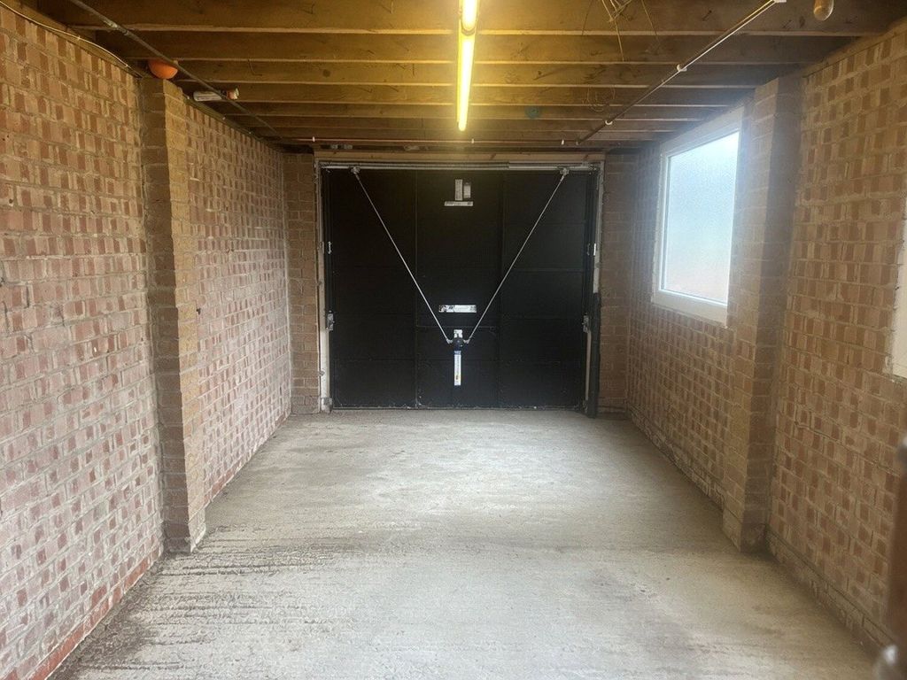 Property photo 2 of 14 Garage
