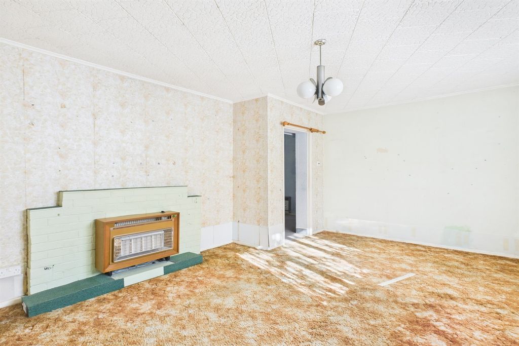 Property photo 2 of 11 Living Area