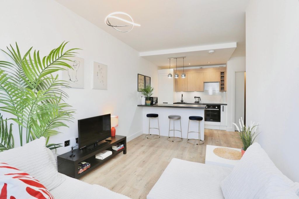 Property photo 1 of 17 Living Area