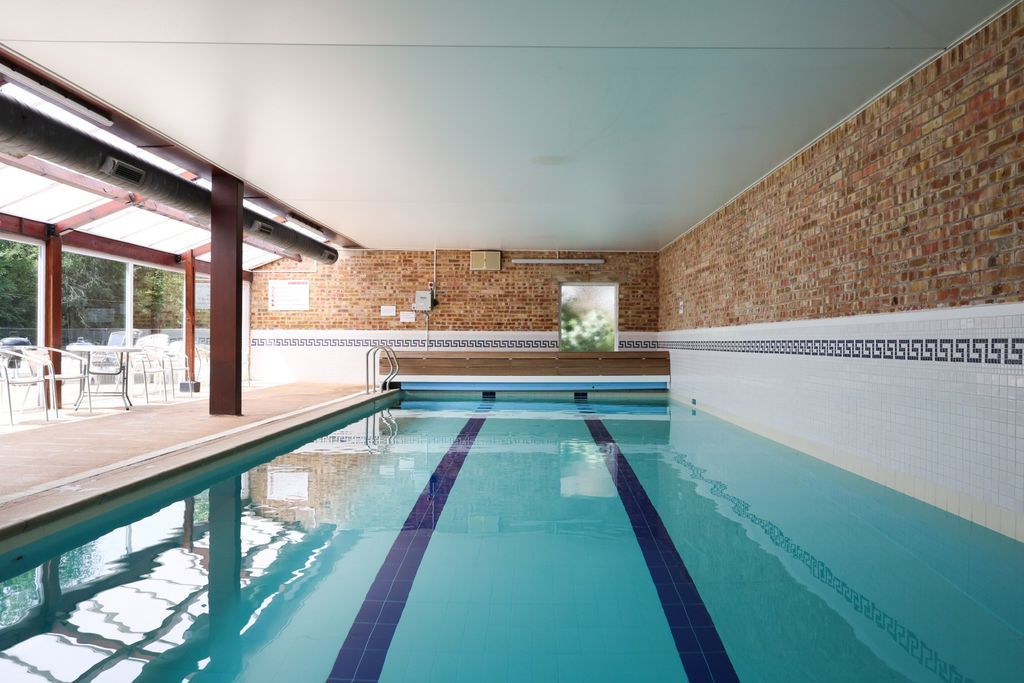 Property photo 3 of 24 Communal Swimming Pool