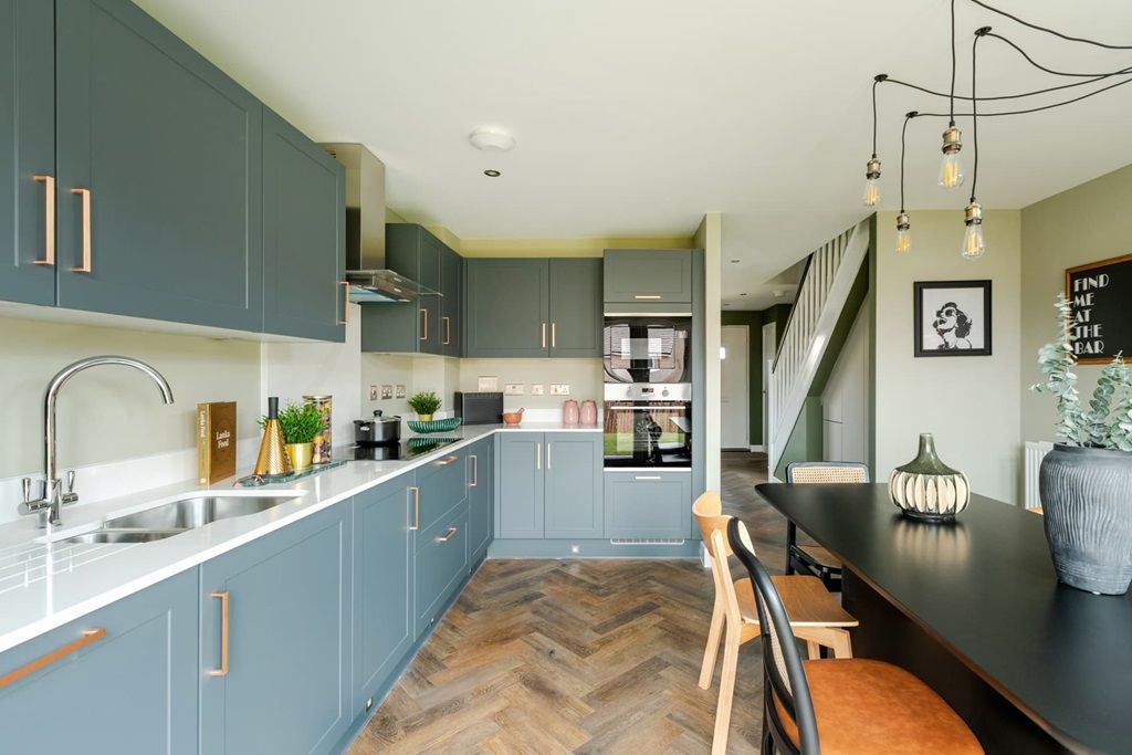 Property photo 3 of 14 A Modern Kitchen With Ample Storage Space