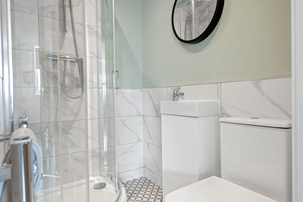 Property photo 1 of 7 Modern, Clean Bathroom With A Spacious Shower Encl...