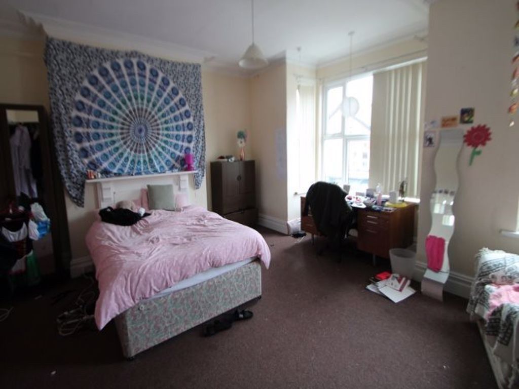 Property photo 3 of 16 A Bright And Welcoming Bedroom Featuring A Comfort...
