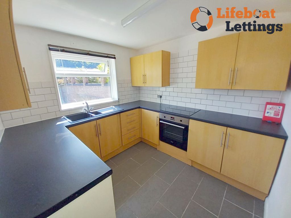 Property photo 2 of 9 Kitchen