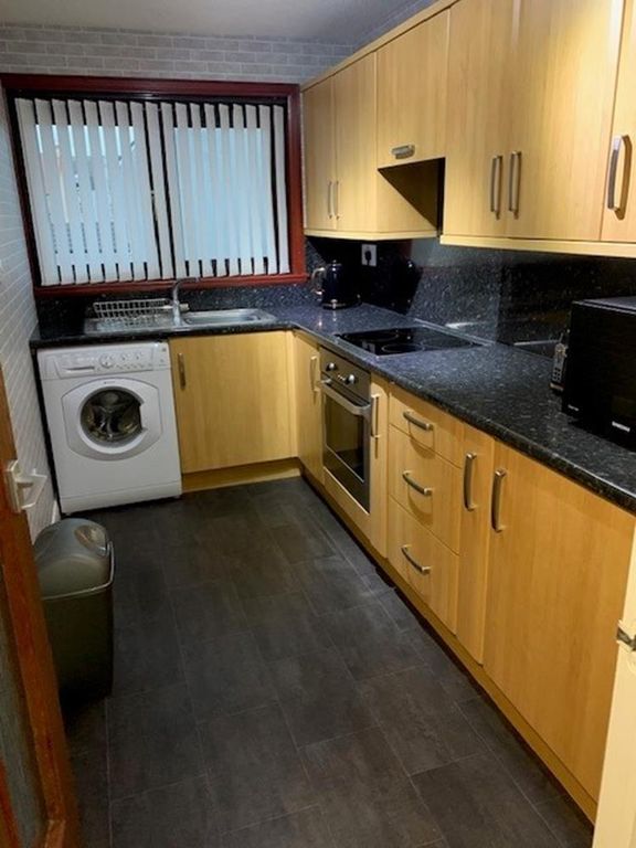 Property photo 3 of 6 Kitchen