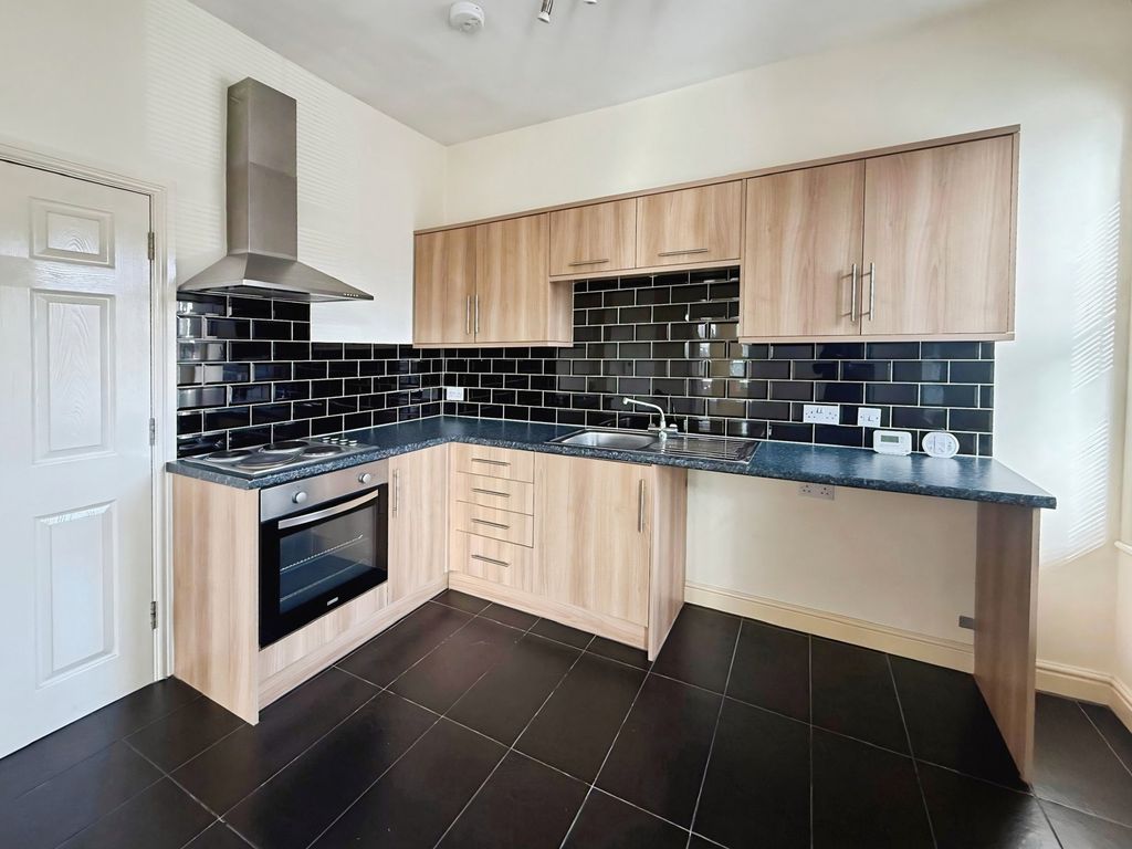 Property photo 3 of 7 Kitchen Area