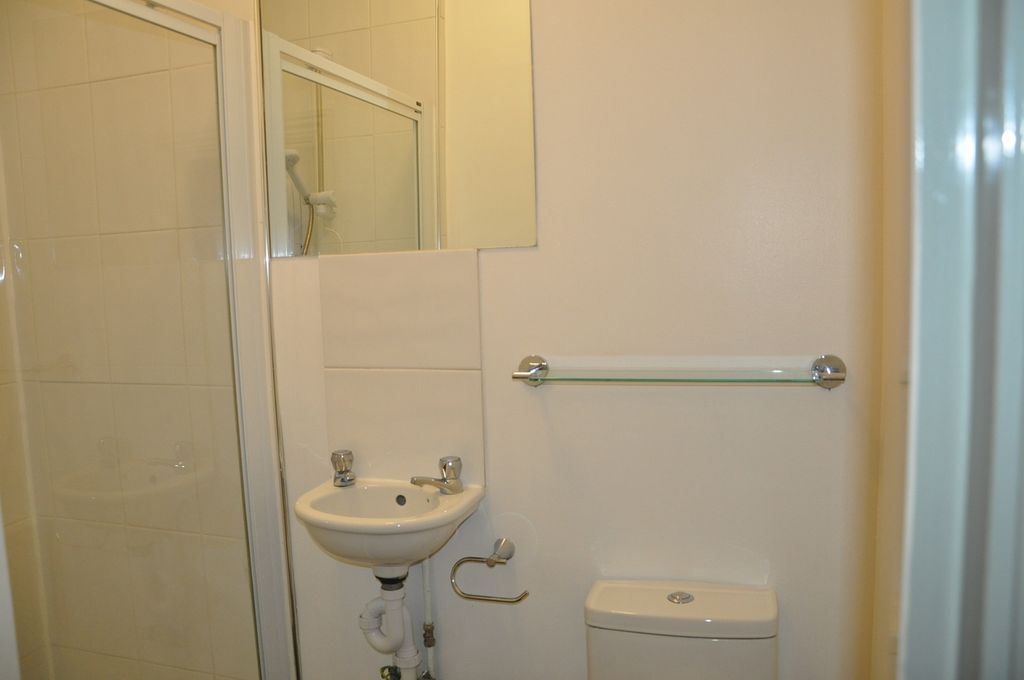 Property photo 2 of 14 A Tidy And Functional Bathroom With A Shower, Perf...