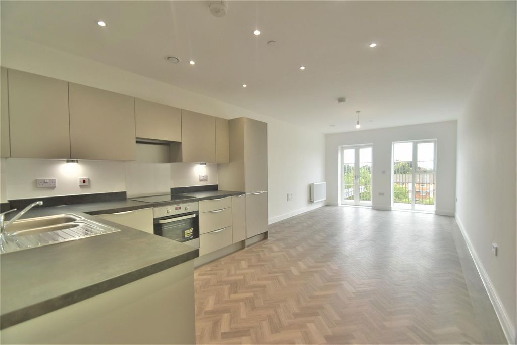 Property photo 2 of 9 Kitchen/Living Area