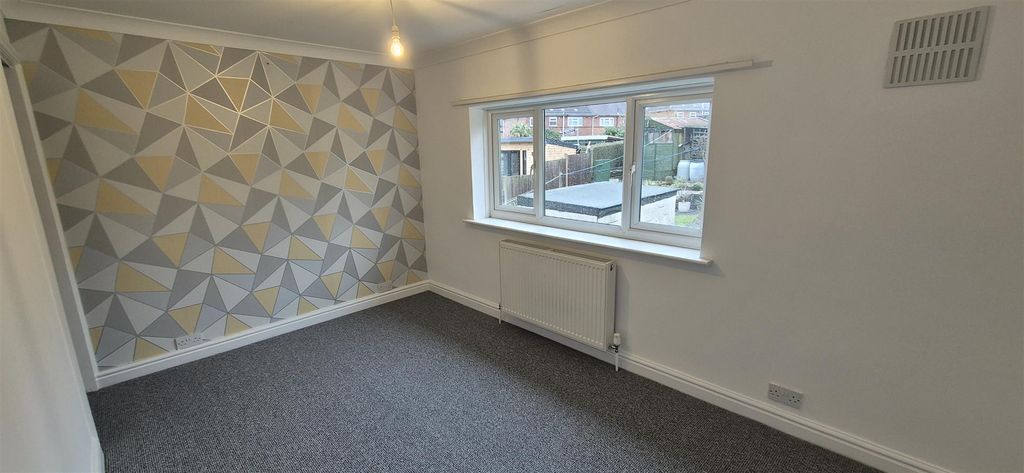 Property photo 3 of 6 Rear Bedroom