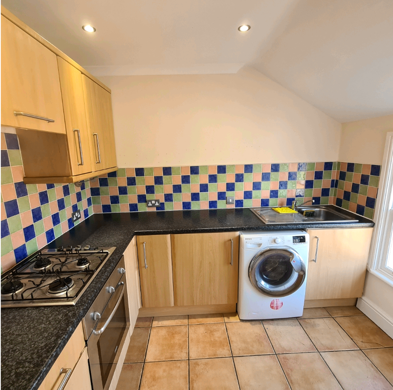 Property photo 3 of 7 Kitchen