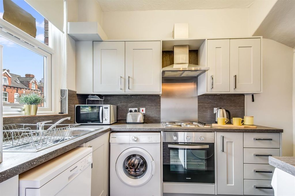 Property photo 3 of 13 Modern Bright Kitchen With Sleek Grey Cabinets...