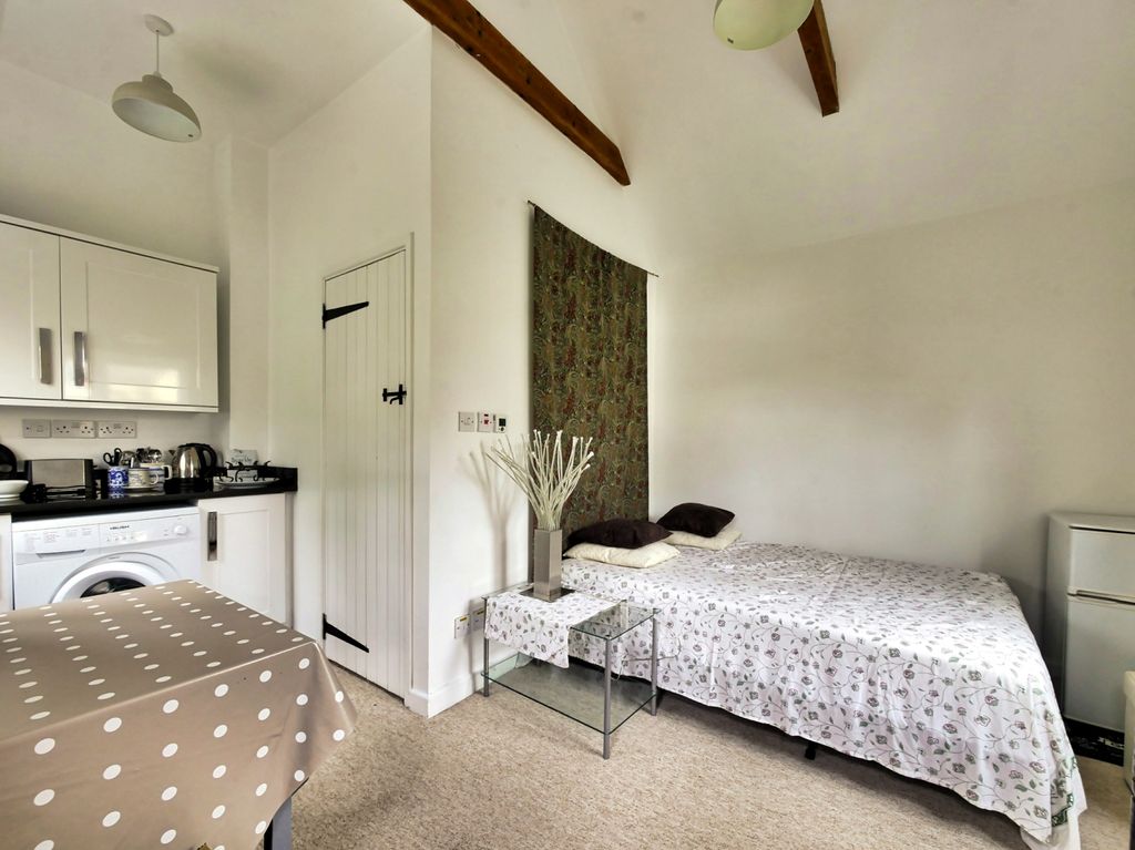 Property photo 2 of 6 Living Area