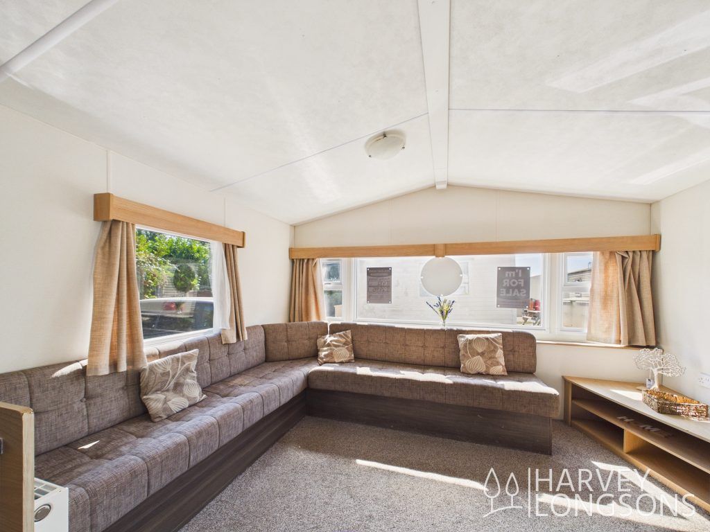 Property photo 3 of 13 Bright Lounge With Wrap-Around Seating And Large Windows