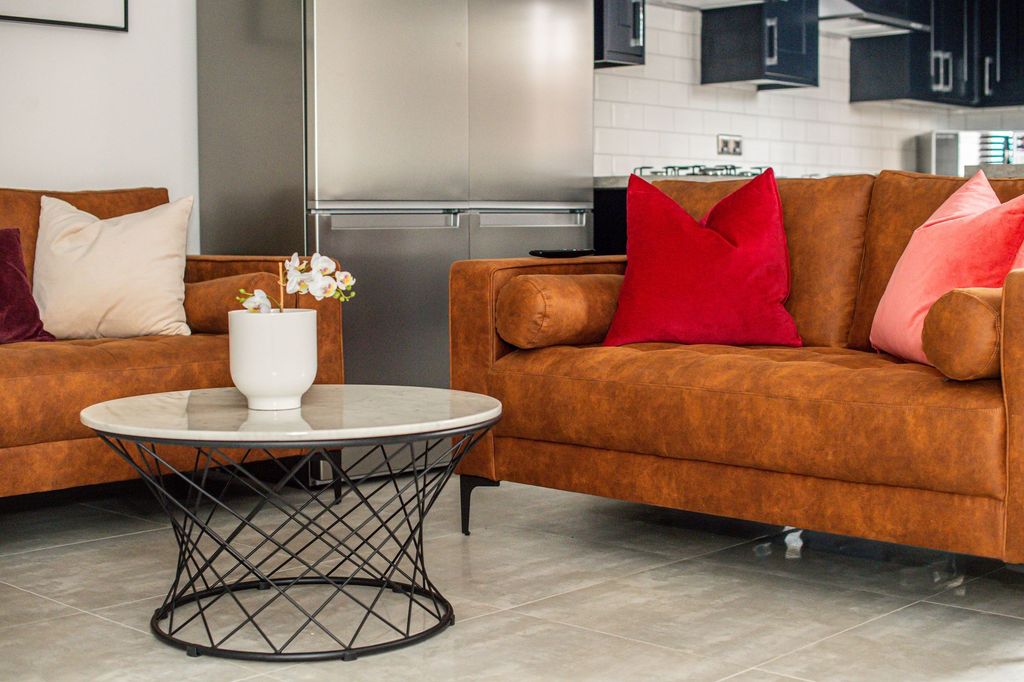 Property photo 3 of 6 A Modern And Stylish Living Room Featuring Comfort...