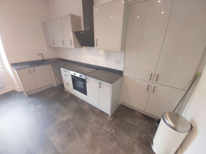 Property photo 3 of 7 Kitchen
