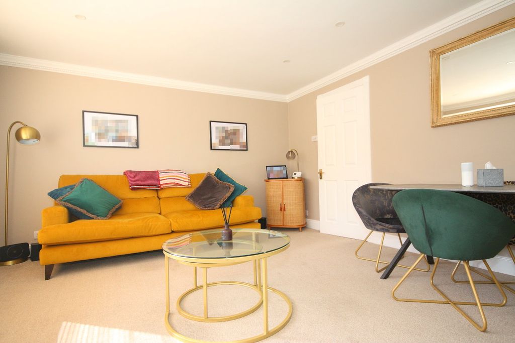 Property photo 2 of 8 Living & Dining Area