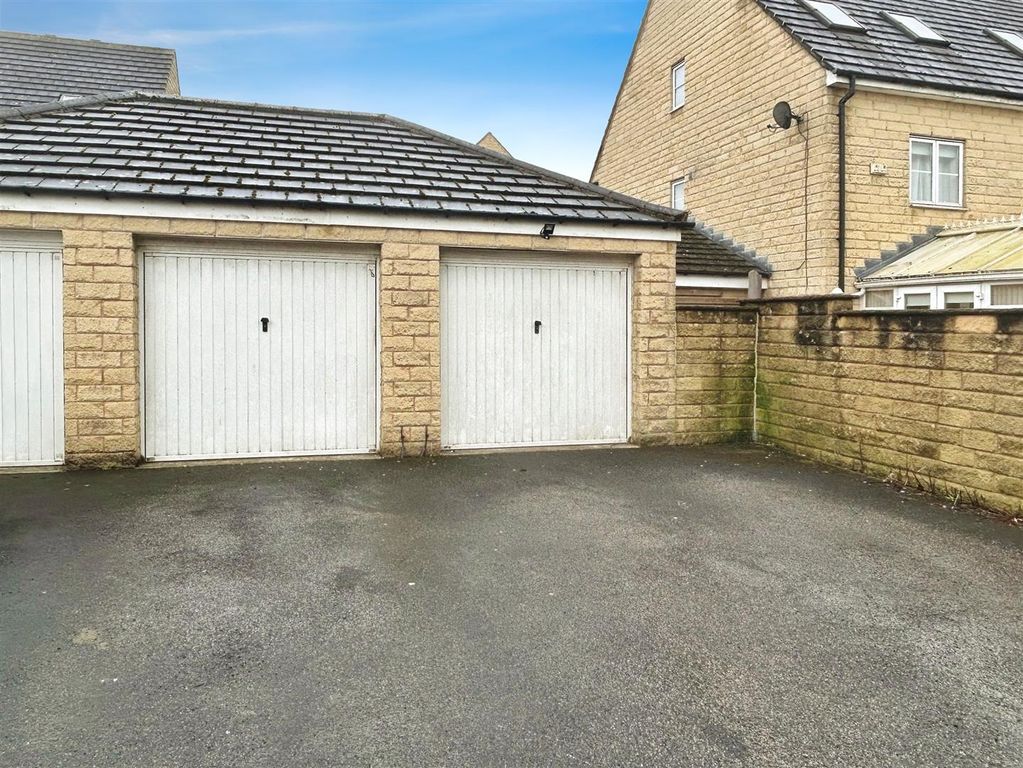 Property photo 2 of 12 Garage & Driveway