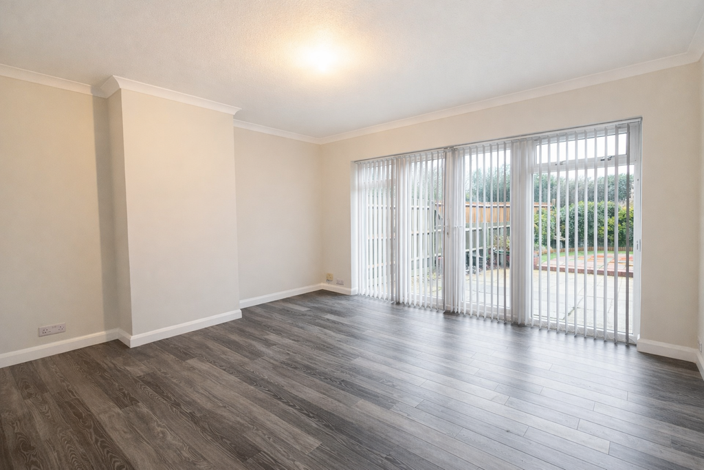 Property photo 3 of 8 Spacious Living Room With Backyard View