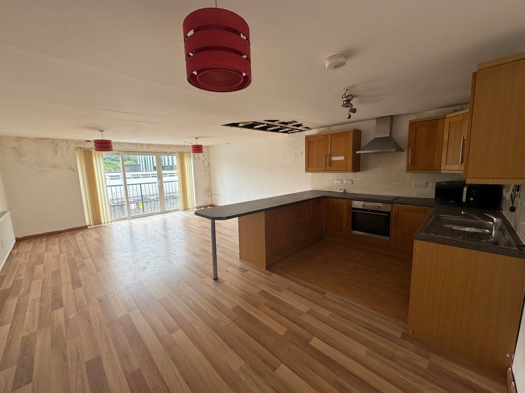 Property photo 2 of 7 Living Area And Kitchen