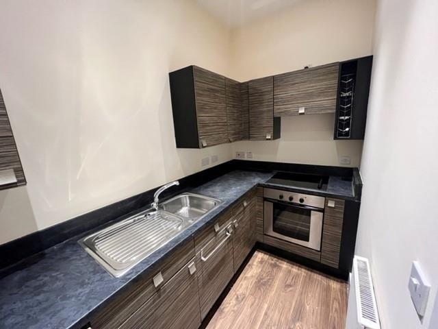 Property photo 3 of 7 Kitchen