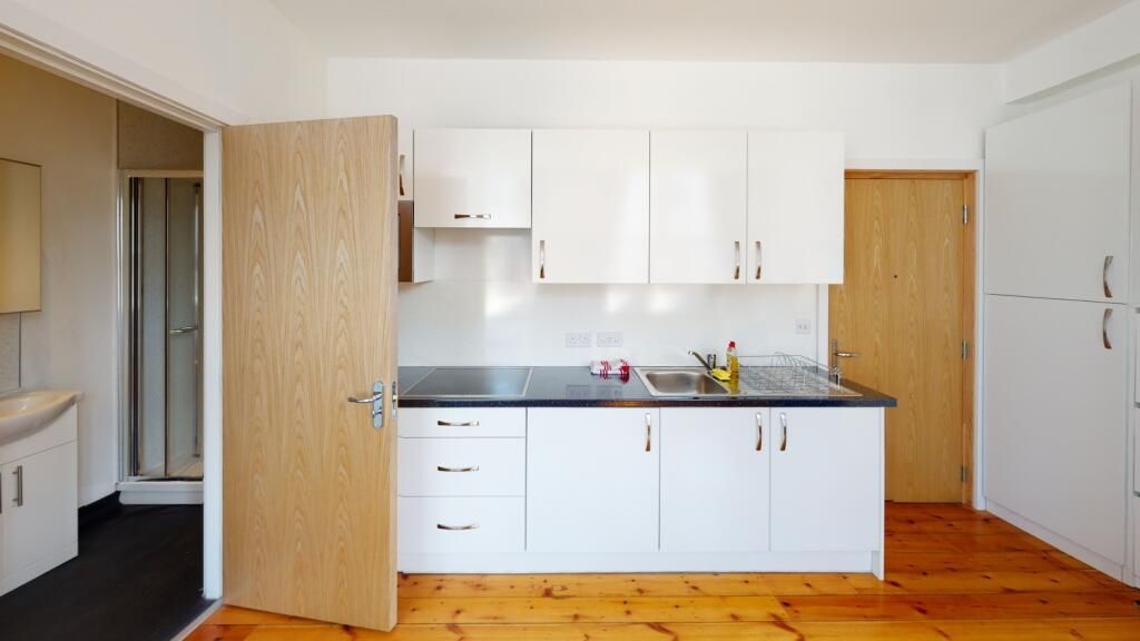 Property photo 3 of 6 Bright And Clean Kitchen With Modern White Cabinet...